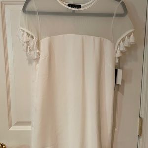 LuLu’s white dress with tassels!